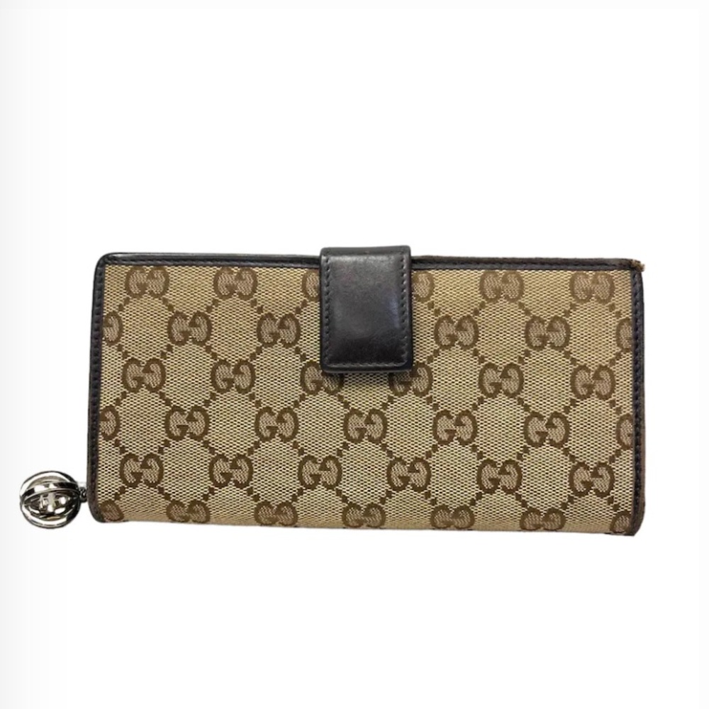 Vintage Gucci supreme monogram wallet with charm zipper